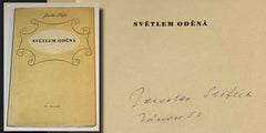 SEIFERT; JAROSLAV: SVĚTLEM ODĚNÁ. - 1946. 3. vyd. České básně sv. 47. Podpis autora 'Vánoce 52'.