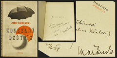 Muzika - MAŘÁNEK; JIŘÍ: KOUZELNÝ DEŠTNÍK. - 1928. Fotomontážní obálka a ilustrace FRANTIŠEK MUZIKA. Podpis autora.