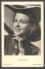 DORA KOMAR.
